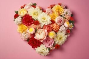 HeartShaped Mothers Day Flower Arrangement on Light Pink Background photo