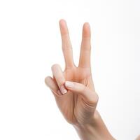 Peaceful Gesture Woman Showing Peace Sign on White Background photo