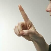 Snap your fingers with ease Woman demonstrating finger snapping motion on white background photo