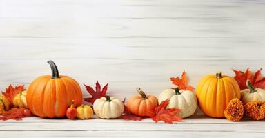 Thanksgiving Pumpkins on White Wooden Surface Covered with Fall Leaves AI Generated photo