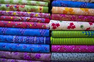 Multicolor textile printed fabrics pattern texture background wallpaper photo