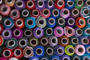 Multicolored Sewing threads pattern texture can be used as a background wallpaper photo