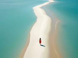 woman beach sand paradise ocean sea back drone top view waves silence serenity zen tranquility photo