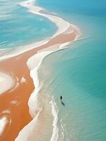 woman beach sand paradise ocean sea back drone top view waves silence serenity zen tranquility photo