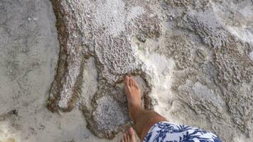 Man walking on travertine terraces in Pamukkale, Turkey video