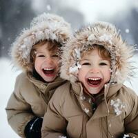 Cheerful siblings having fun in the snow photo