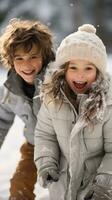 Cheerful siblings having fun in the snow photo