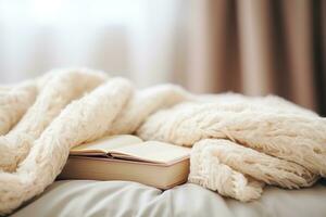 White cup of coffee and book on the autumn mood photo
