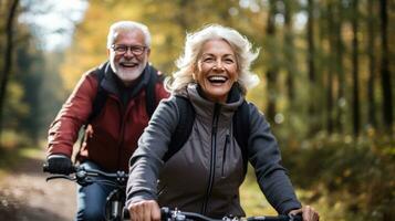 Senior couple riding bicycles together on a scenic route photo