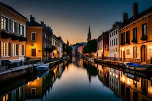 a canal in the middle of a city at dusk photo