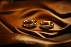dos Boda anillos en un marrón paño. generado por ai foto