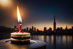 a birthday cake with a lit candle in front of a city skyline. AI-Generated photo