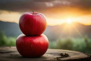 two apples stacked on top of each other in front of a sunset. AI-Generated photo