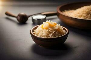 a bowl of rice with a spoon and a wooden spoon. AI-Generated photo