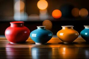 four colorful vases on a wooden table. AI-Generated photo