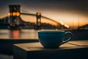 a blue cup sits on a table in front of a bridge. AI-Generated photo