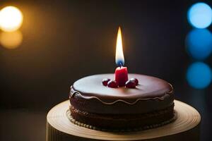 a chocolate cake with a single candle on top. AI-Generated photo