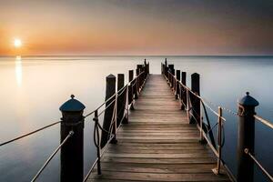 a long pier with wooden posts leading to the ocean. AI-Generated photo