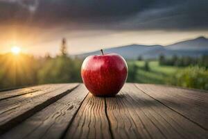 un manzana se sienta en un de madera mesa en frente de un puesta de sol. generado por ai foto