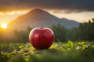 an apple is sitting in the grass with a mountain in the background. AI-Generated photo