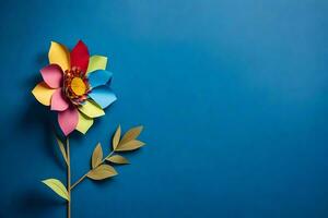 a colorful flower made from paper on a blue background. AI-Generated photo