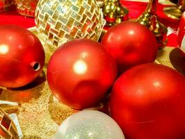 Closeup and crop red Christmas balls for sell and decorated in shopping mall photo