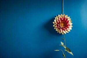 a paper flower hanging from a string. AI-Generated photo