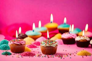 many cupcakes with candles on a pink background. AI-Generated photo