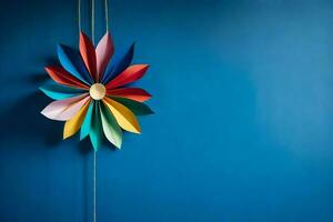 a colorful paper flower hanging from a string. AI-Generated photo