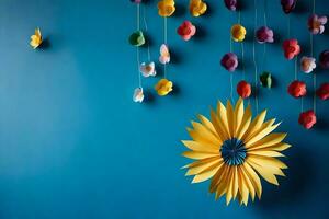 a colorful paper flower hanging from a blue wall. AI-Generated photo