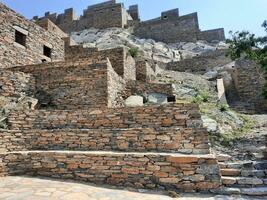 Al Bahah, Saudi Arabia, Sep 2023 - Beautiful daytime view of the historical ruins of Thee Ain Zee Ain or Dhee Ain  Ancient Village in Al Bahah, Saudi Arabia. photo