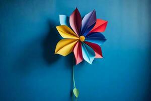 a colorful paper pinwheel on a blue wall. AI-Generated photo