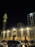 Jeddah, Saudi Arabia, Aug 2023 -  A beautiful night view of the mosque in Balad area of Jeddah, Saudi Arabia. photo