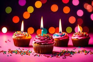 three cupcakes with candles on a pink background. AI-Generated photo