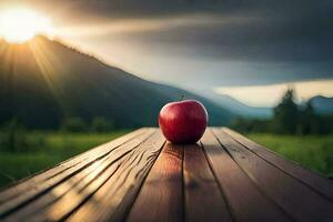 un manzana se sienta en un de madera mesa en frente de un montaña. generado por ai foto