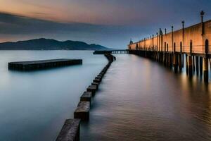 un largo exposición foto de un muelle a puesta de sol. generado por ai