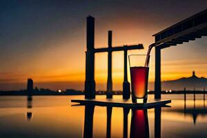 un vaso de rojo vino es sentado en el borde de un muelle a puesta de sol. generado por ai foto