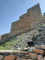 Al Bahah, Saudi Arabia, Sep 2023 - Beautiful daytime view of the historical ruins of Thee Ain Zee Ain or Dhee Ain  Ancient Village in Al Bahah, Saudi Arabia. photo