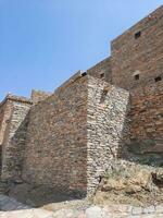 Al Bahah, Saudi Arabia, Sep 2023 - Beautiful daytime view of the historical ruins of Thee Ain Zee Ain or Dhee Ain  Ancient Village in Al Bahah, Saudi Arabia. photo