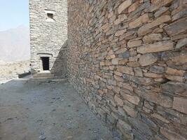 Al Bahah, Saudi Arabia, Sep 2023 - Beautiful daytime view of the historical ruins of Thee Ain Zee Ain or Dhee Ain  Ancient Village in Al Bahah, Saudi Arabia. photo