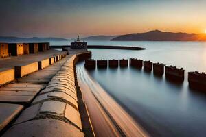 the sun sets over the water in front of a pier. AI-Generated photo