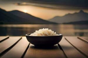 a bowl of rice on a wooden table in front of a lake. AI-Generated photo