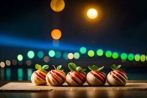 four strawberries are sitting on a wooden board with lights in the background. AI-Generated photo