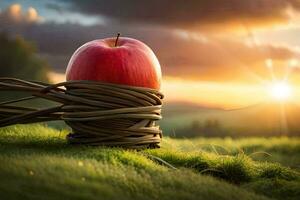 an apple is wrapped in a wire and sitting on a grassy field. AI-Generated photo