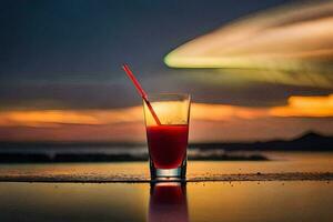 un vaso de rojo líquido sentado en el borde de un piscina. generado por ai foto