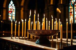 velas son iluminado en un Iglesia con manchado vaso ventanas generado por ai foto