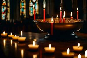 velas son iluminado en un cuenco en frente de un iglesia. generado por ai foto