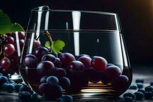 un vaso de vino con uvas y hojas. generado por ai foto