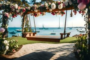 a swing with flowers on it overlooking the ocean. AI-Generated photo