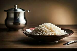 a bowl of rice sits on a table next to a silver tea pot. AI-Generated photo